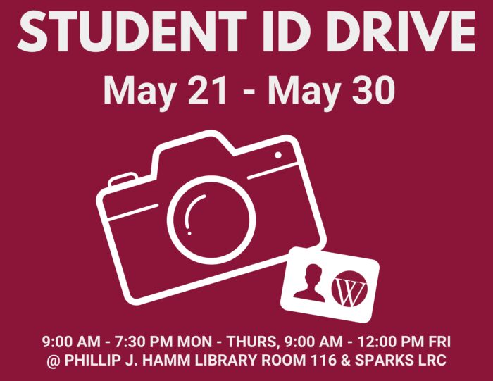 A maroon background poster promoting a "Student ID Drive" taking place from May 21 to May 30. A large white camera icon is centered with a student ID card illustration in the bottom-right corner. Text below reads: “9:00 AM – 7:30 PM Mon – Thurs, 9:00 AM – 12:00 PM Fri @ Phillip J. Hamm Library Room 116 & Sparks LRC.”