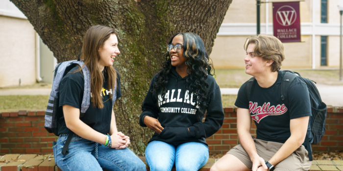 Three Wallace Students in Courtyard
