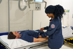 Radiologic Technology students in a lab simulation