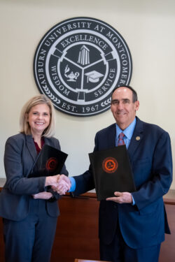 Wallace Dean Leslie Reeder with AUM Chancellor Carl Stockton