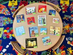 Childrens books on a table in the child development classroom