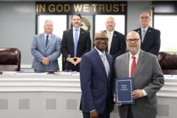 Dr. Chris Franklin WCCD Dean of Student Services accepts CC Month proclamation from Houston County Commission